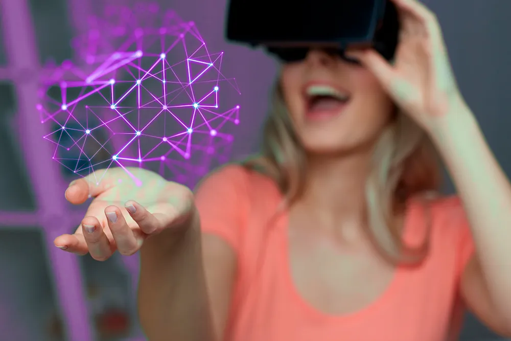<p>Woman with VR glasses trying to touch a purple projection.</p>
