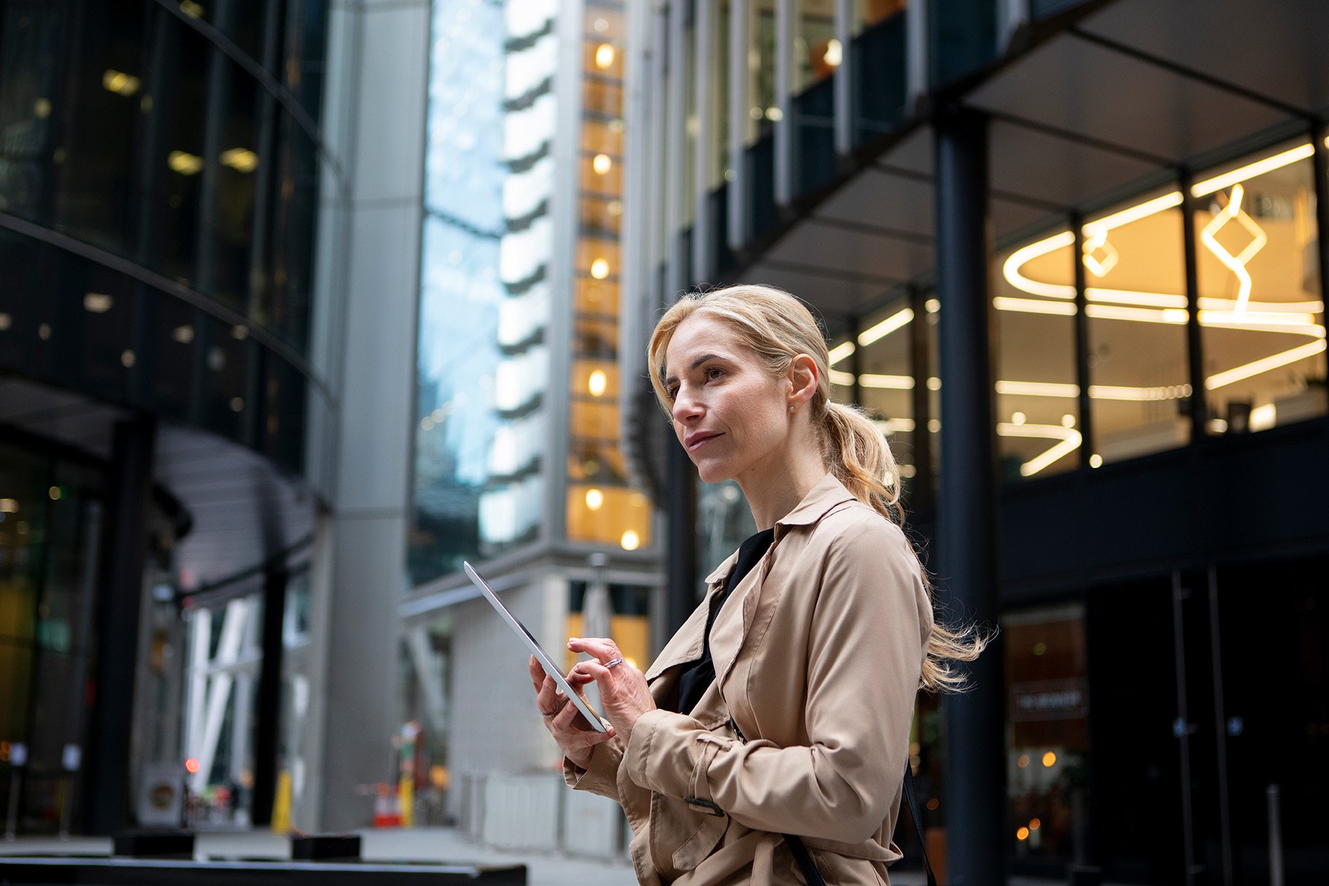 woman-working-her-tablet-outside